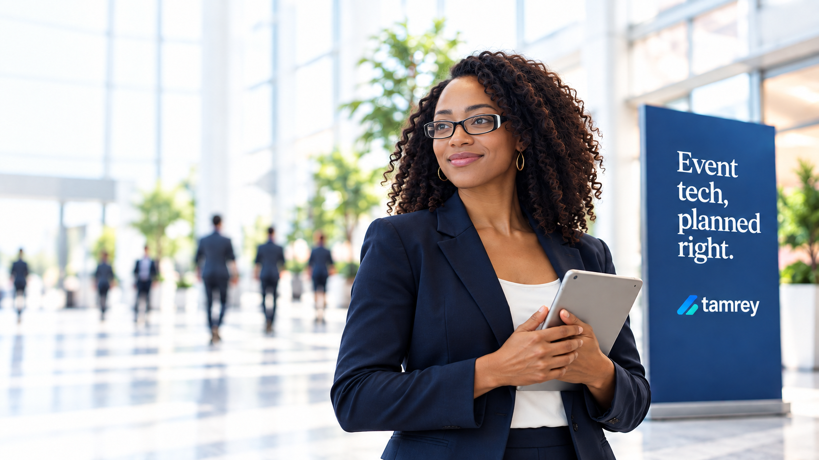 Black event professional with tablet